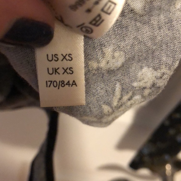 Free People Printed Turnt Black Floral Long Sleeve Bodysuit in Night Combo - Picture 6 of 6